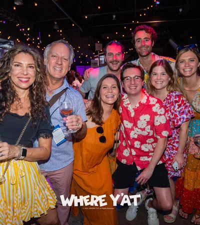 a group of people posing for a photo