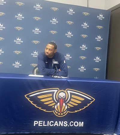 a person sitting at a podium
