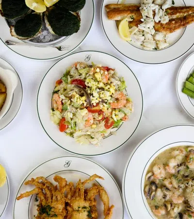 a table full of plates of food