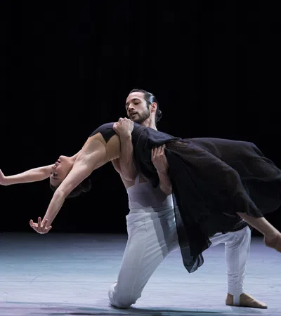 a man and woman dancing