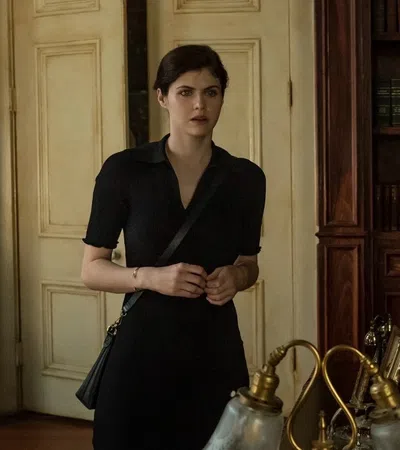 Alexandra Daddario in a black dress