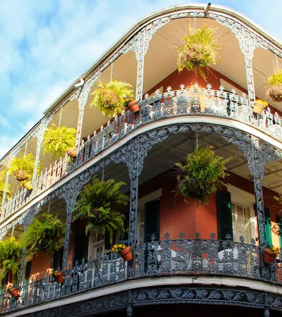 a building with plants growing on the roof