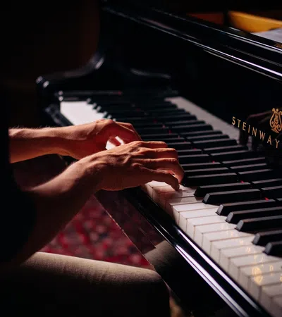 a person playing a piano