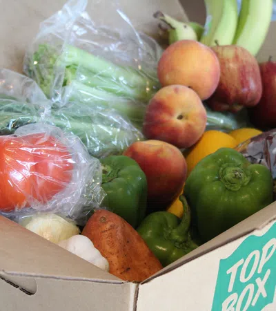 a box of fruit and vegetables on display