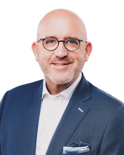 Professional man with a blue blaser and glasses