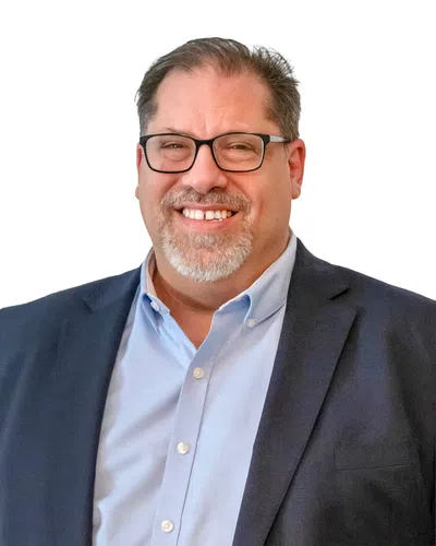 Professional man with a gray blaser and glasses