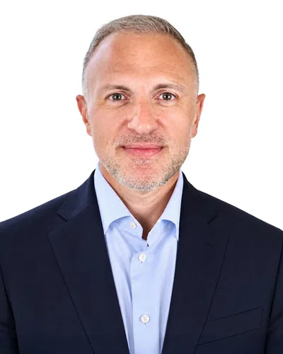 Professional looking businessman in a blue suit suit with a blue shirt
