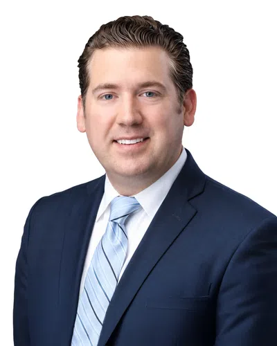 Professional man with a blue blaser and blue tie