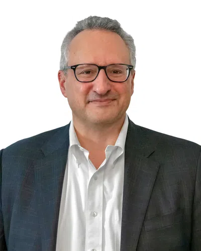 Professional man with a gray blaser and glasses