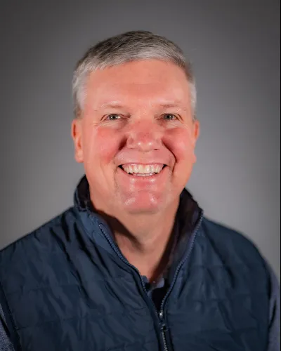 a man smiling for the camera