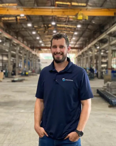 a man standing in a warehouse