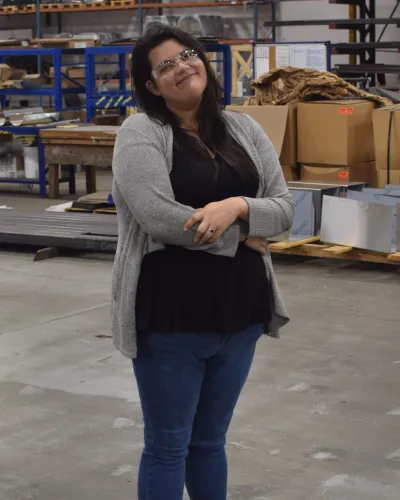 a man standing in a warehouse