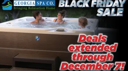 Three people relaxing in a hot tub during Georgia Spa Co's Black Friday sale promotion.