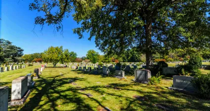 a cemetery with many gravestones