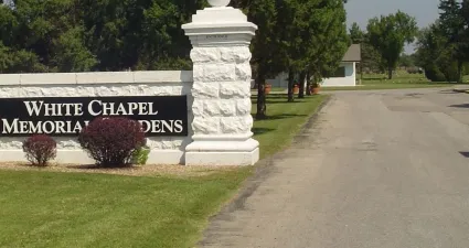 a sign on the side of a road