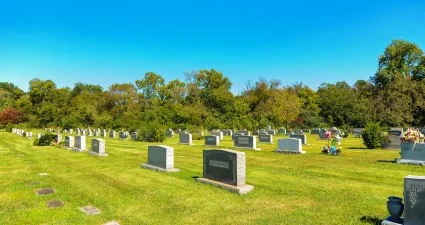 a cemetery with many gravestones