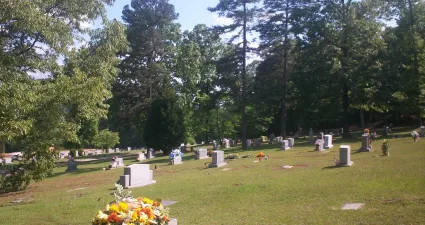 a cemetery with many tombstones