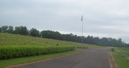 a road with a flag on it and a flag on the side