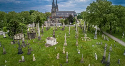 a cemetery with a church in the background