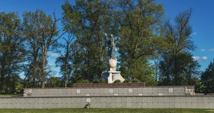a statue in a park