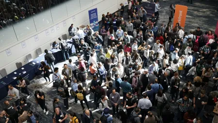 a large group of people in a hall