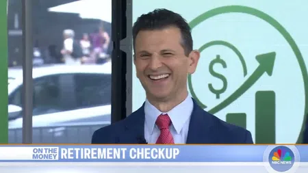 Smiling man in suit and red tie on NBC News segment about retirement checkup with financial growth graphic in background