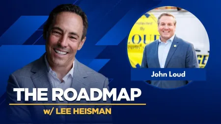 Smiling man in gray suit on blue background with text The Roadmap w Lee Heisman and photo of John Loud in circle.