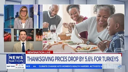 NewsNation broadcast showing two anchors and a family enjoying Thanksgiving dinner with lower third headline about turkey price drop.