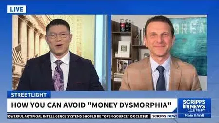 Two news anchors discussing how to avoid money dysmorphia on a live Scripps News segment.