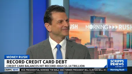 News anchor discussing record credit card debt of $1.14 trillion on Scripps News Morning Rush segment.