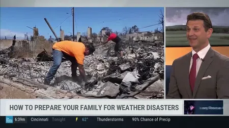 Two people clearing debris in a burnt area alongside a man in a suit discussing weather disaster preparedness on TV