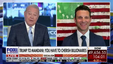 Fox Business news broadcast showing host and guest discussing Trump and billionaires with stock market ticker below