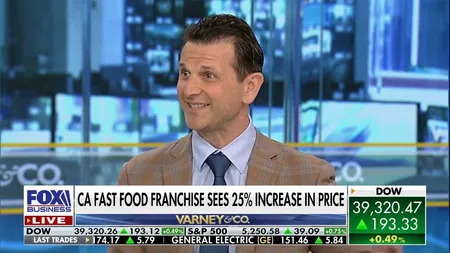 TV news segment on Fox Business with analyst discussing 25% price increase in California fast food franchise.