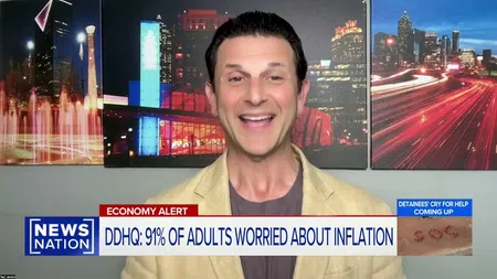 News anchor delivers report on 91% of adults worried about inflation with cityscape background and news graphics.