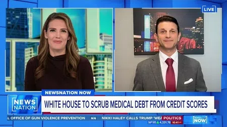 NewsNation broadcast showing two anchors discussing White House removing medical debt from credit scores.