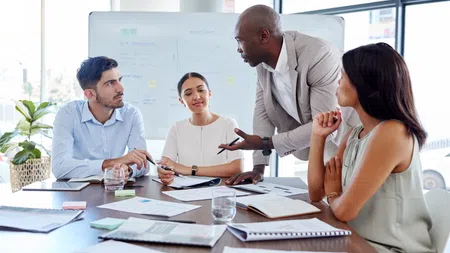 a group of people discussing something