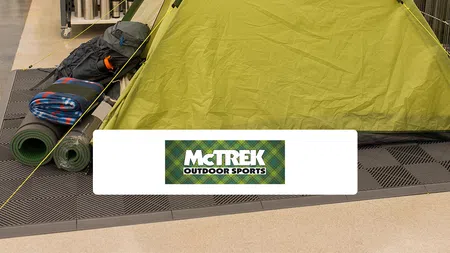 a green tent on a table