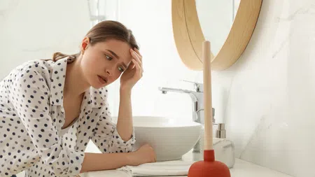 a woman sitting at a table