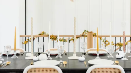 a table with candles and glasses