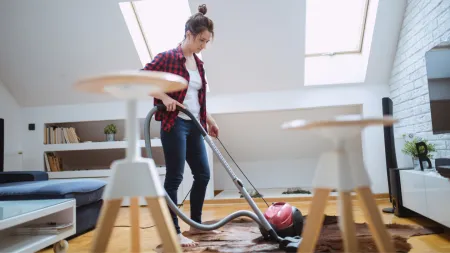 a person holding a broom