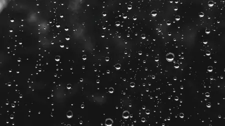 a window with raindrops on it