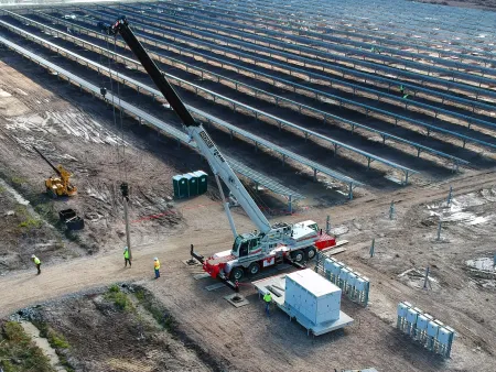 Solar pads on helical piles