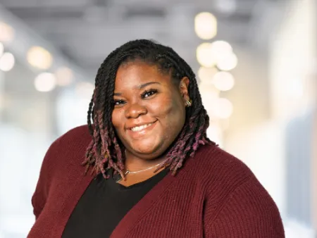 a woman smiling at the camera