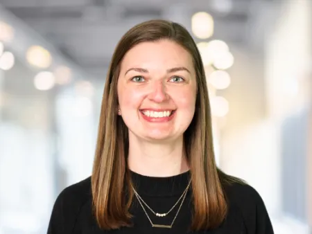 a woman smiling at the camera