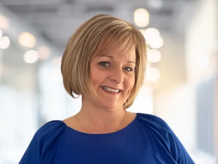 a woman in a blue shirt