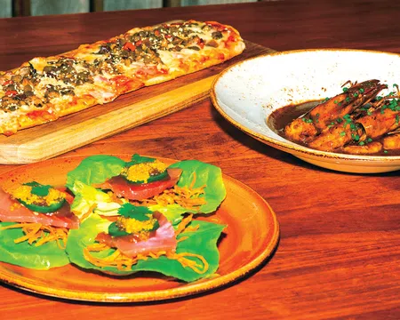 pizzas on plates on a table