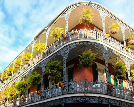 a building with plants growing on the roof