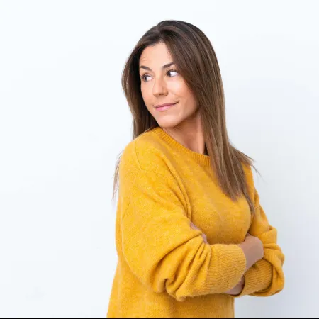 a woman in a yellow shirt