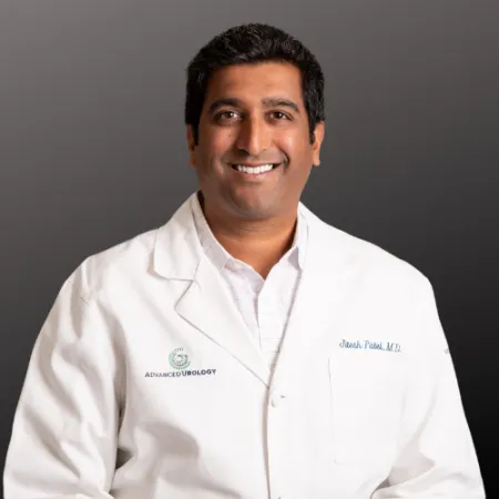 Jitesh Patel wearing a white coat