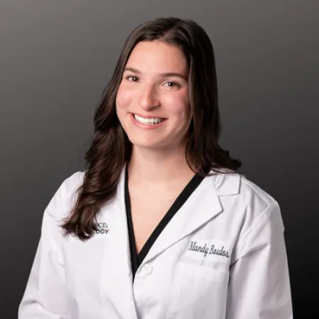 a person wearing a white coat